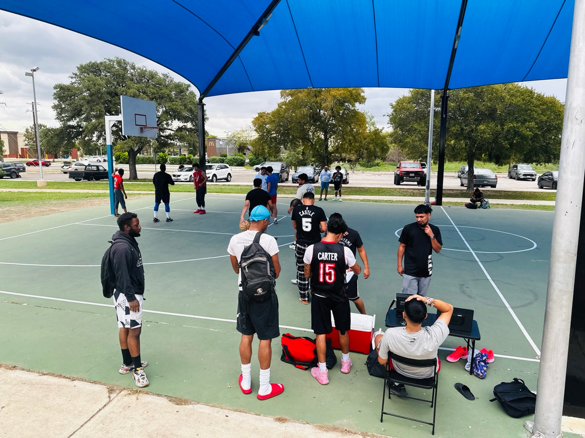Hoopers gathering on the covered court at the Palo Alto Park run